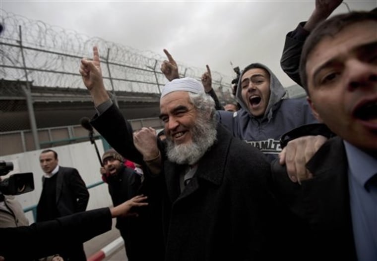 Sheik Raed Salah, the leader of the northern branch of the Islamic movement in Israel,  atcenter, is surrounded by supporters after his release Sunday from Ayalon prison.